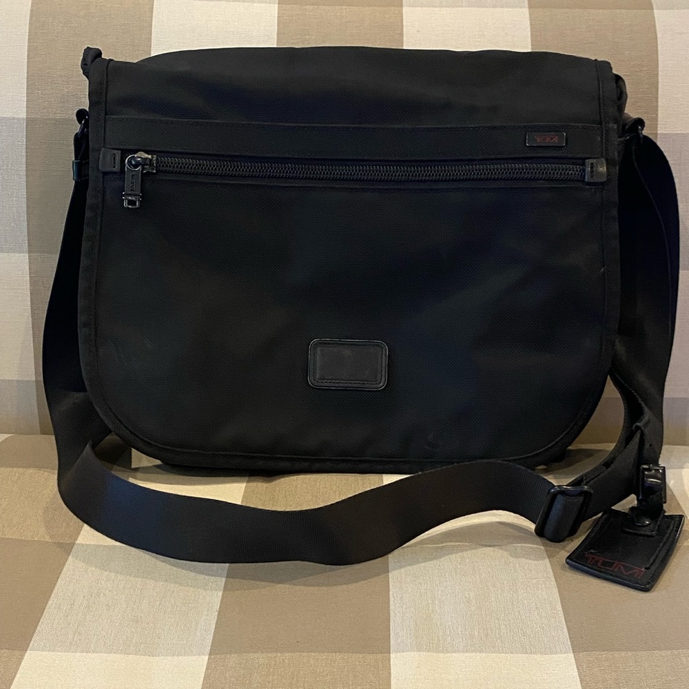 Tumi ballistic nylon messenger bag.